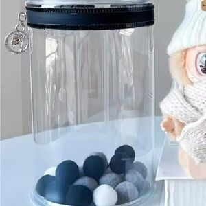 Clear labubu HOLDER with Black and White Pom Poms